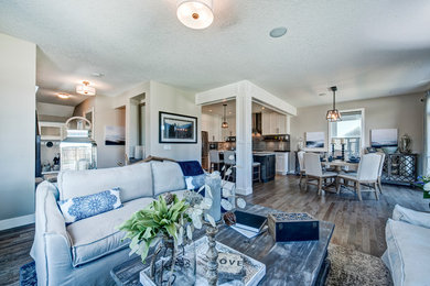 Example of a trendy light wood floor living room design in Calgary