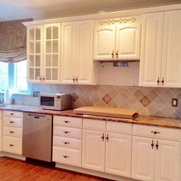 Buttercream painted cabinets refacing