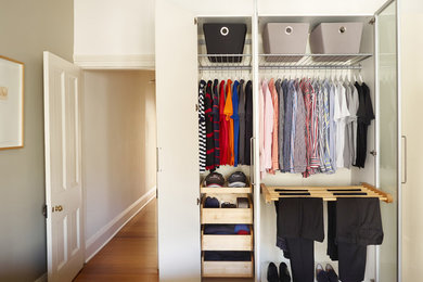 Photo of a transitional storage and wardrobe in Sydney.
