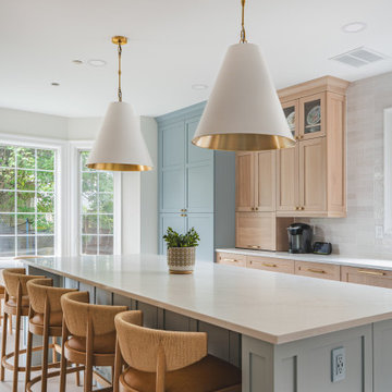 Scandinavian Kitchen with Light Oak Cabinets and Quartzite Island