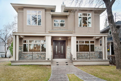 Inspiration for a transitional exterior home remodel in Calgary