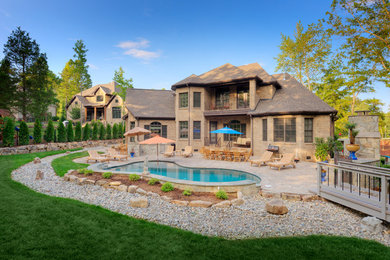Pool - mid-sized modern pool idea in Charlotte
