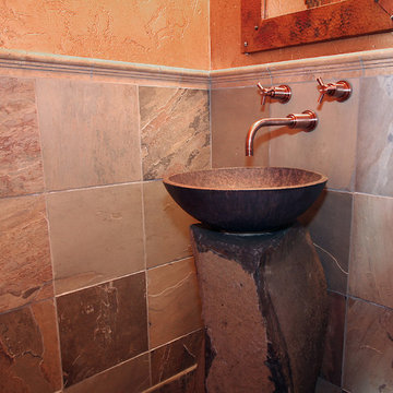 Copper and stone pedestal sink