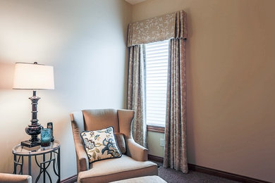 Inspiration for a mid-sized timeless master bedroom remodel in Omaha with black walls and no fireplace