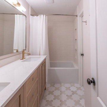 Playful Guest Bath Remodel with Fun Tile and Mixed Metals