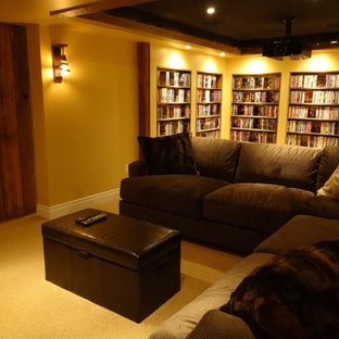 Inspiration for a rustic enclosed home cinema in Ottawa with yellow walls, carpet and yellow floors.