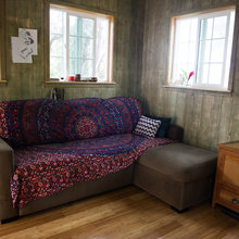 Divano con coperta