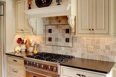 Inspiration for a mid-sized farmhouse galley light wood floor open concept kitchen remodel in Philadelphia with white cabinets, granite countertops, gray backsplash, ceramic backsplash, an island, a farmhouse sink, beaded inset cabinets and stainless steel appliances