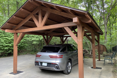 Example of a detached one-car carport design in New York