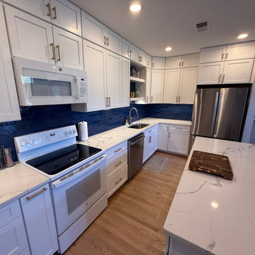 Open-Concept White Kitchen Remodel with Navy Backsplash in Arlington, VA
