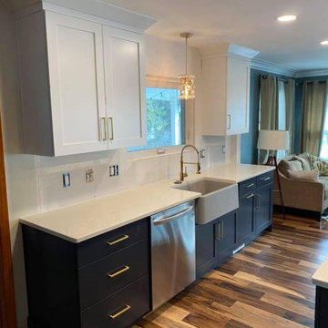 Cabinets: Showplace EVO Door Style Pierce Extra White Uppers, Hail Navy Lowers &