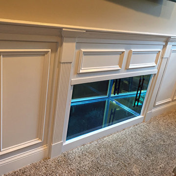 Basement renovation with Custom fish tank built in