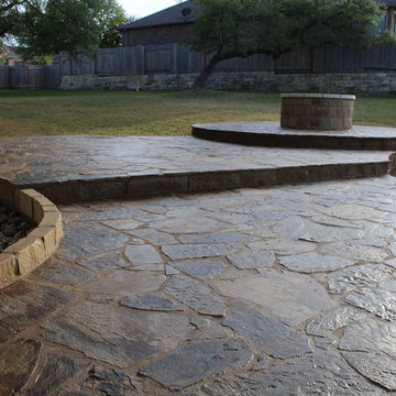 Get rid of your builder grade patio and extend it with a fire pit
