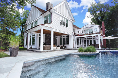 Pool - huge transitional stone and custom-shaped natural pool idea in New York