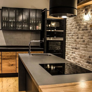 Industrial style living - room and kitchen furniture by Cuibul de Design.