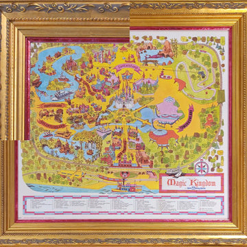 Disneyworld map framed with "Hidden Mickey" frame.