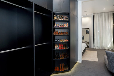 This is an example of a contemporary storage and wardrobe in Geelong.