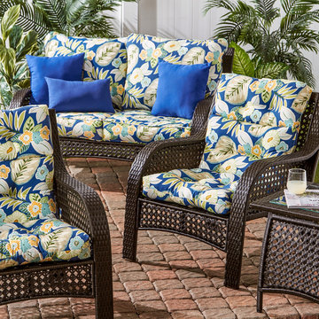 Wicker Woven Lounge Set with Floral Print Cushions and a Jolt of Blue