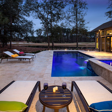 Rice Hope Elevated Spa Spilling into Elegant Pool