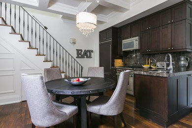 Eat-in kitchen - small rustic l-shaped dark wood floor and brown floor eat-in kitchen idea in Other with an undermount sink, shaker cabinets, dark wood cabinets, black backsplash, stone slab backsplash, stainless steel appliances and a peninsula