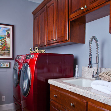 Contemporary laundry room with recycled glass counter