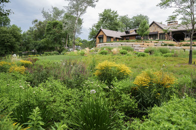 Photo of a traditional full sun backyard landscaping in Omaha for summer.