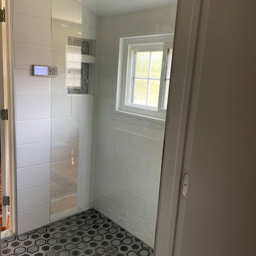 Alexandria barrier free shower and wall mount vanity bathroom remodel