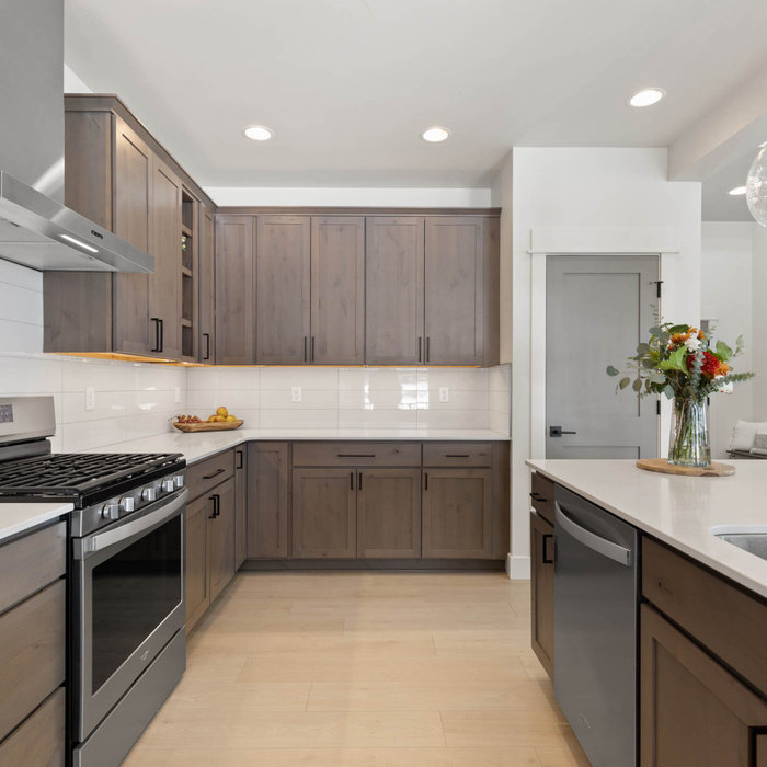 Example of a farmhouse home design design in Other