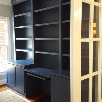 Dark Blue Office Built-in With Center Desk and Pullouts
