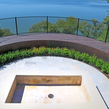 Waterfront deck with pool featuring Rustic Walnut composite decking
