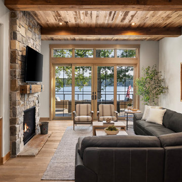 Antique Skim Oak Paneling and White Oak Mantel in a Lakeside Living Room