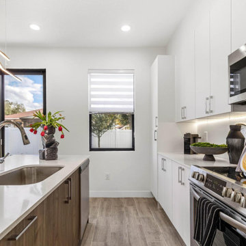 Modern Kitchen with Blue Mosaic Backsplash
