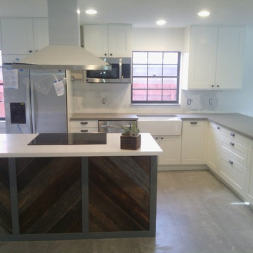Modern Aventura Kitchen with Barnwood Accent