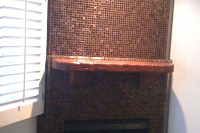 Mid-sized minimalist enclosed family room photo in Los Angeles with a standard fireplace and a tile fireplace