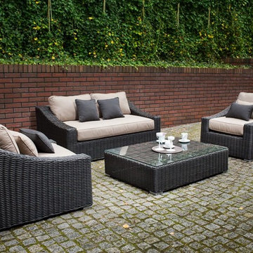 Toja Patio Furniture - Tuscan Love Seat Set - Red Brick Wall