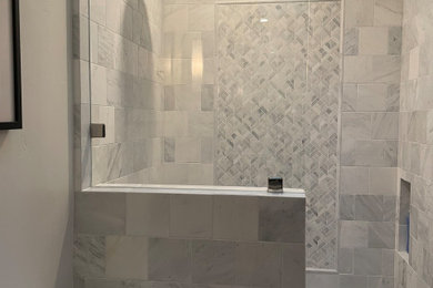 Inspiration for a contemporary white tile bathroom remodel in Other