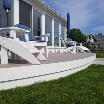 Waterfront Sunroom Features Harvey Windows & AZEK Decking, Fairhaven, MA