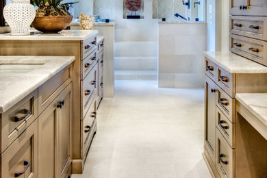 Bathroom - large transitional master porcelain tile porcelain tile and white floor bathroom idea in Other with recessed-panel cabinets, an undermount sink, quartzite countertops, light wood cabinets, white walls and beige countertops