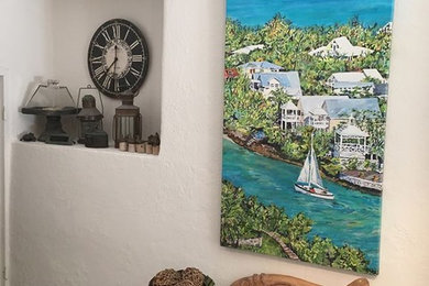 Example of a beach style home design design in Miami