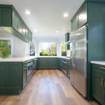 U-shaped, natural toned transitional kitchen