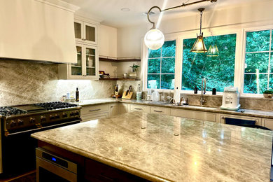 Large eat-in kitchen photo in Atlanta with beaded inset cabinets, quartzite countertops and an island
