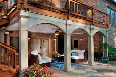 Mid-sized traditional backyard verandah in Atlanta.