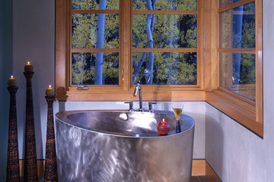 Inspiration for a large master blue tile and stone tile limestone floor bathroom remodel in Denver with white walls
