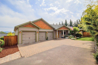 Example of an arts and crafts exterior home design in Other