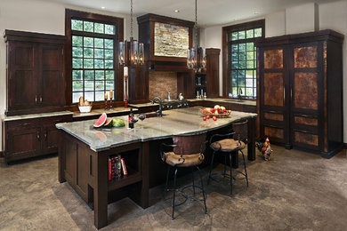 Kitchen - contemporary kitchen idea in Denver with shaker cabinets, dark wood cabinets and paneled appliances