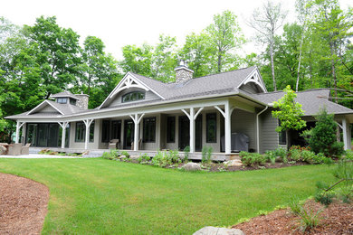 Arts and crafts one-story mixed siding exterior home photo in Toronto