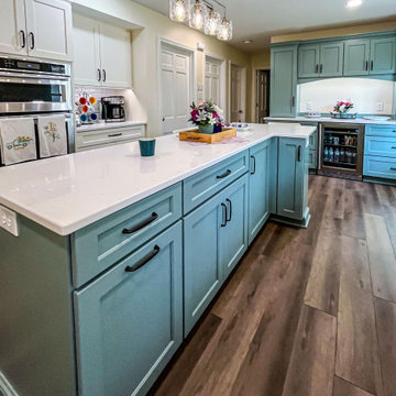 Custom Two-Toned Green and White Kitchen with Laventa Carrara Quartz Countertops