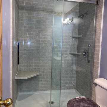 Roman Stone shower with subway simulated tile