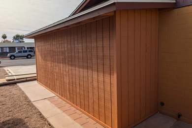 Garage - mid-century modern garage idea in Phoenix