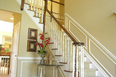 Staircase - mid-sized traditional wooden l-shaped wood railing staircase idea in New York with wooden risers